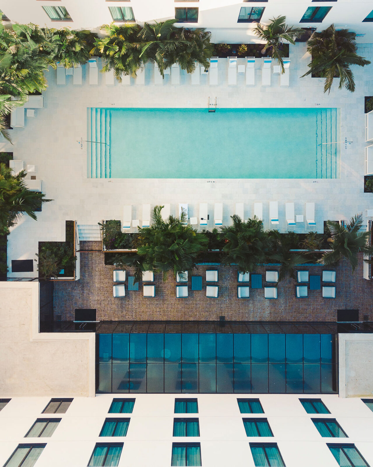 Overhead view of the pool and outdoor lounge area at our boutique hotel in Tampa