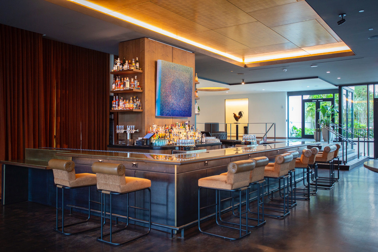 Warm lighting over a bar at our boutique hotel in Tampa, Florida