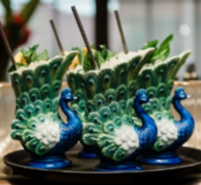 Three blue peacocks at Flor Fina a Tampa restaurant