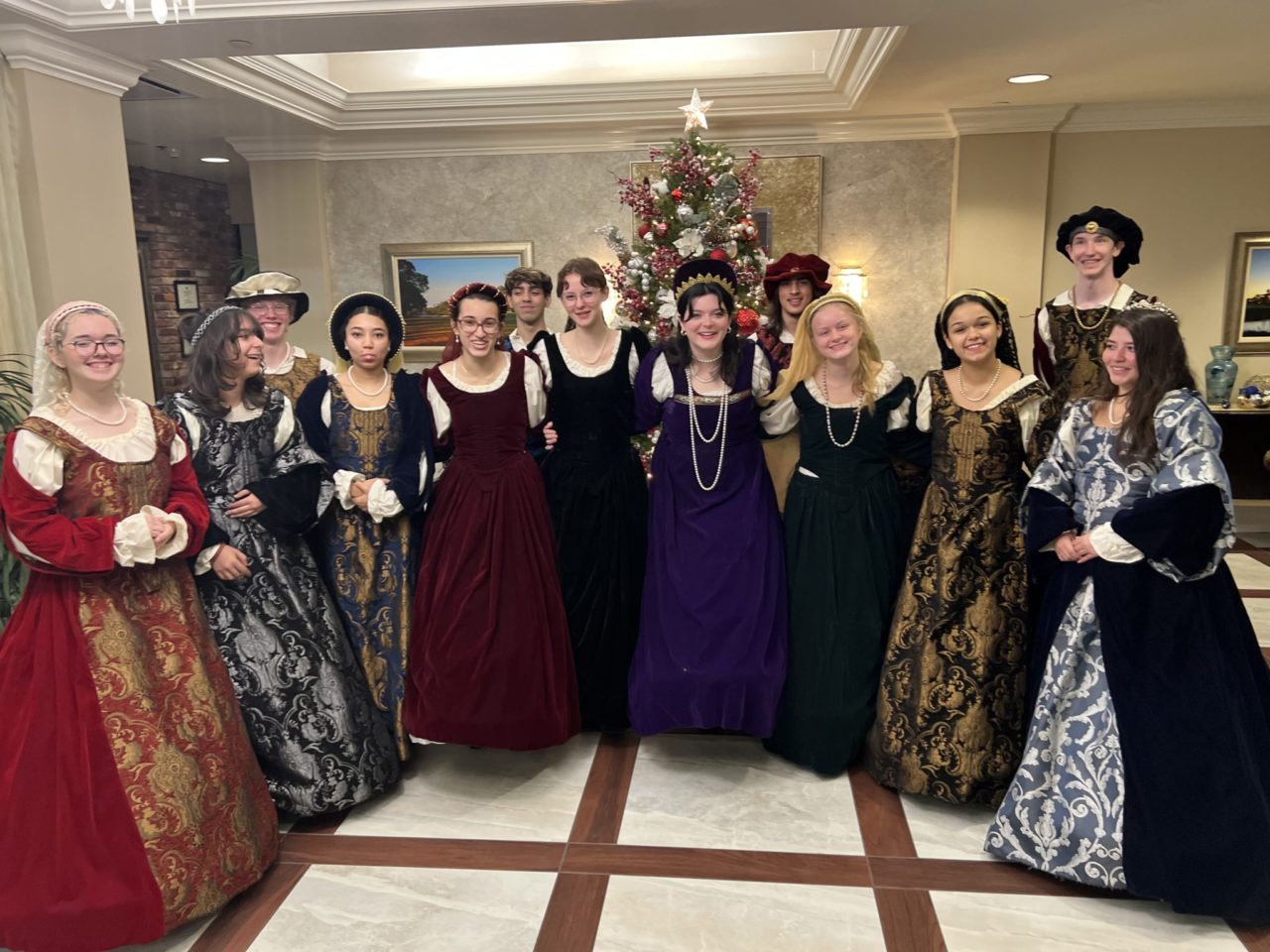 High schoolers posing in Renaissance dress at our Ybor City, Florida hotel